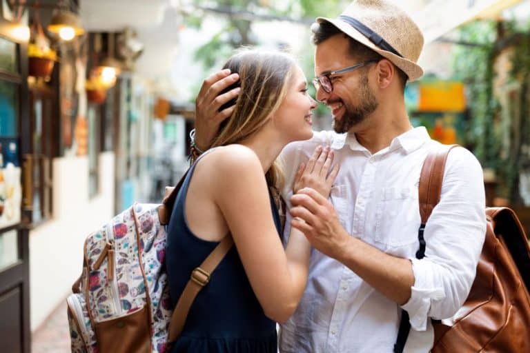 Romantic vacation in Jerusalem - A couple hugging, strolling through the city of Jerusalem